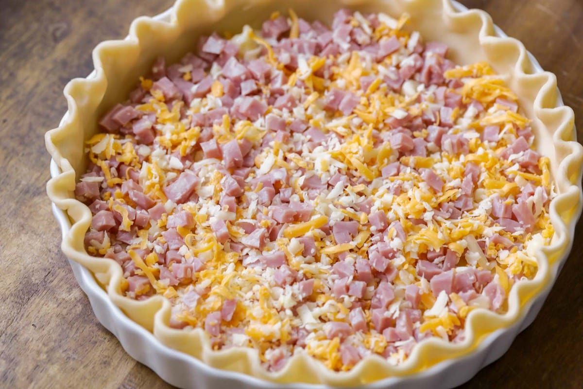 Ham and cheese inside a pie crust for breakfast quiche.