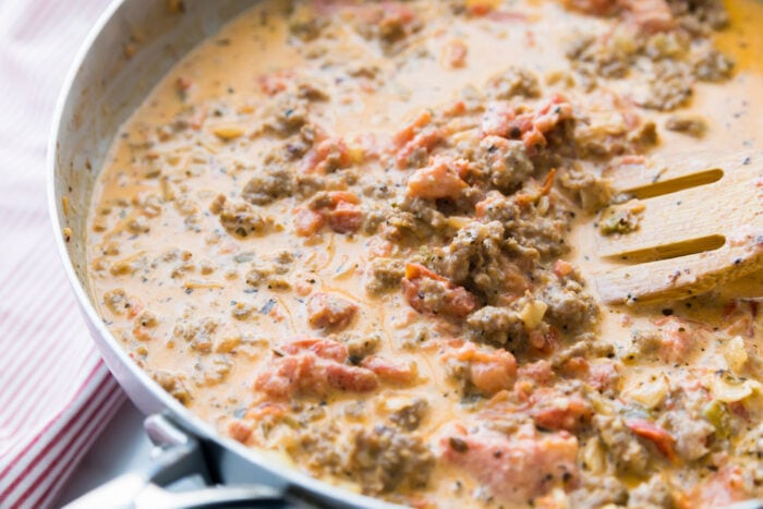 Savory creamy Sausage Penne Pasta is quick, easy, and on the table in no time! It's cheesy and sure to be a family favorite!! Sausage sauce for Sausage Penne Pasta.