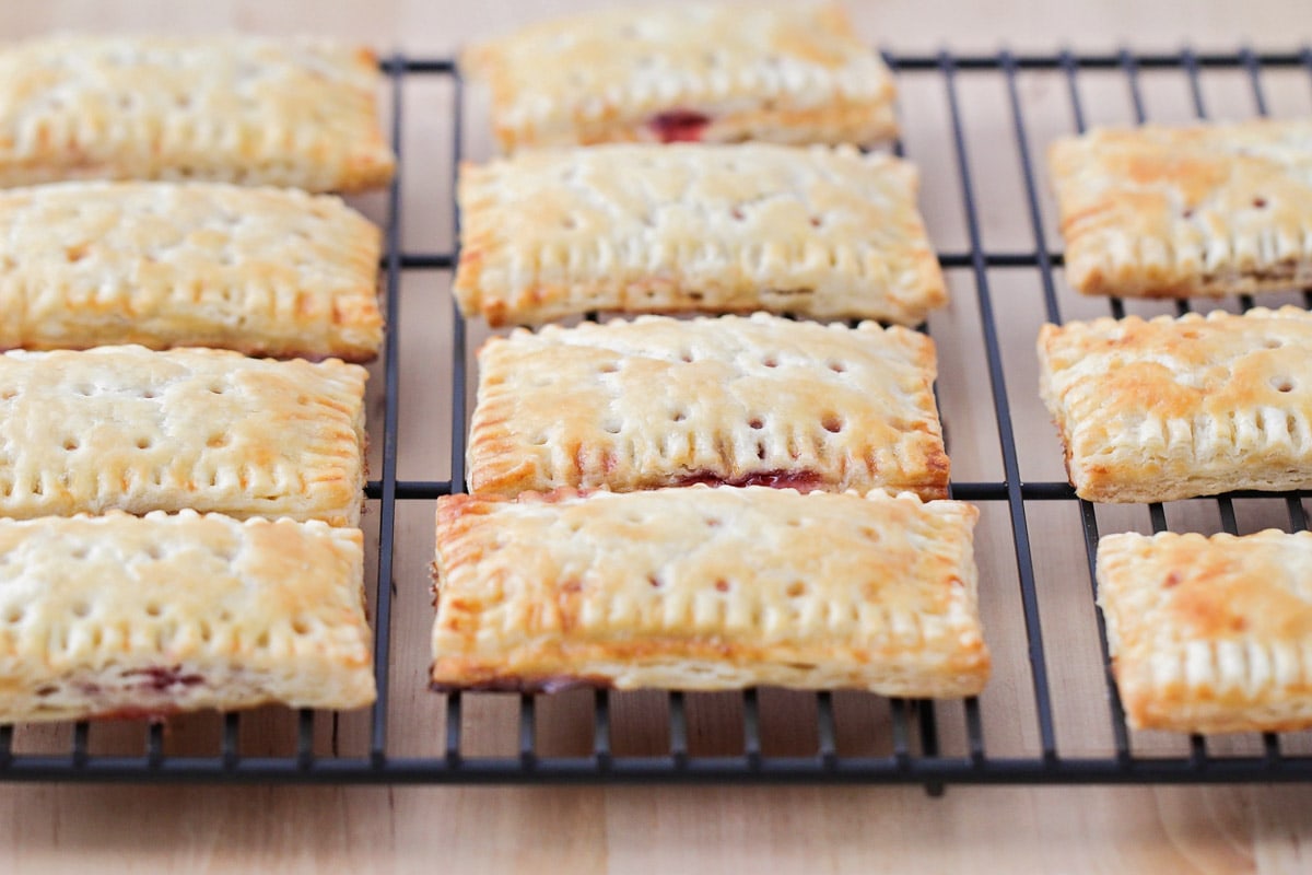 Homemade poptarts cooling on a wire rack after baking