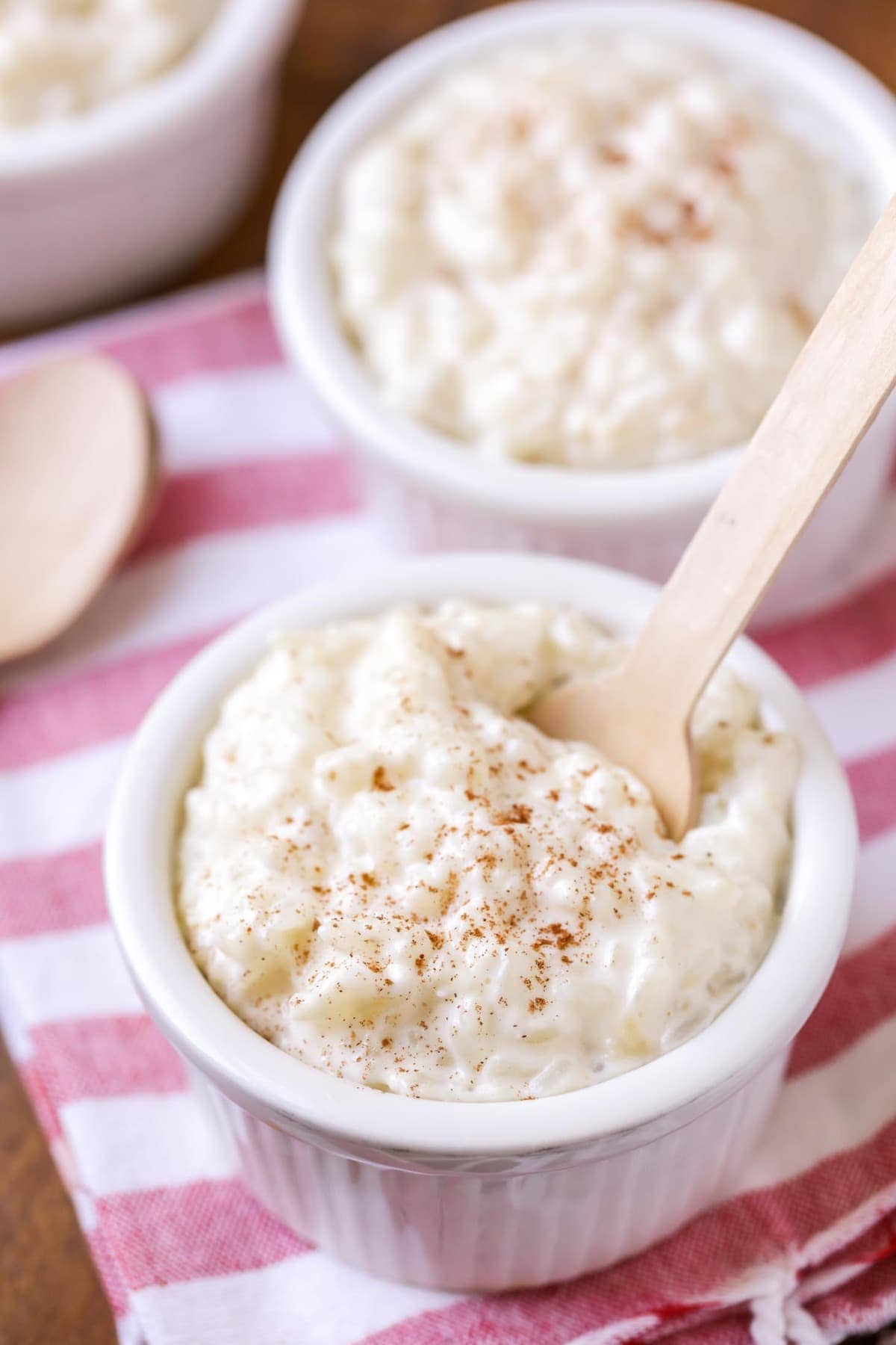 Creamy rice pudding in small white bowls