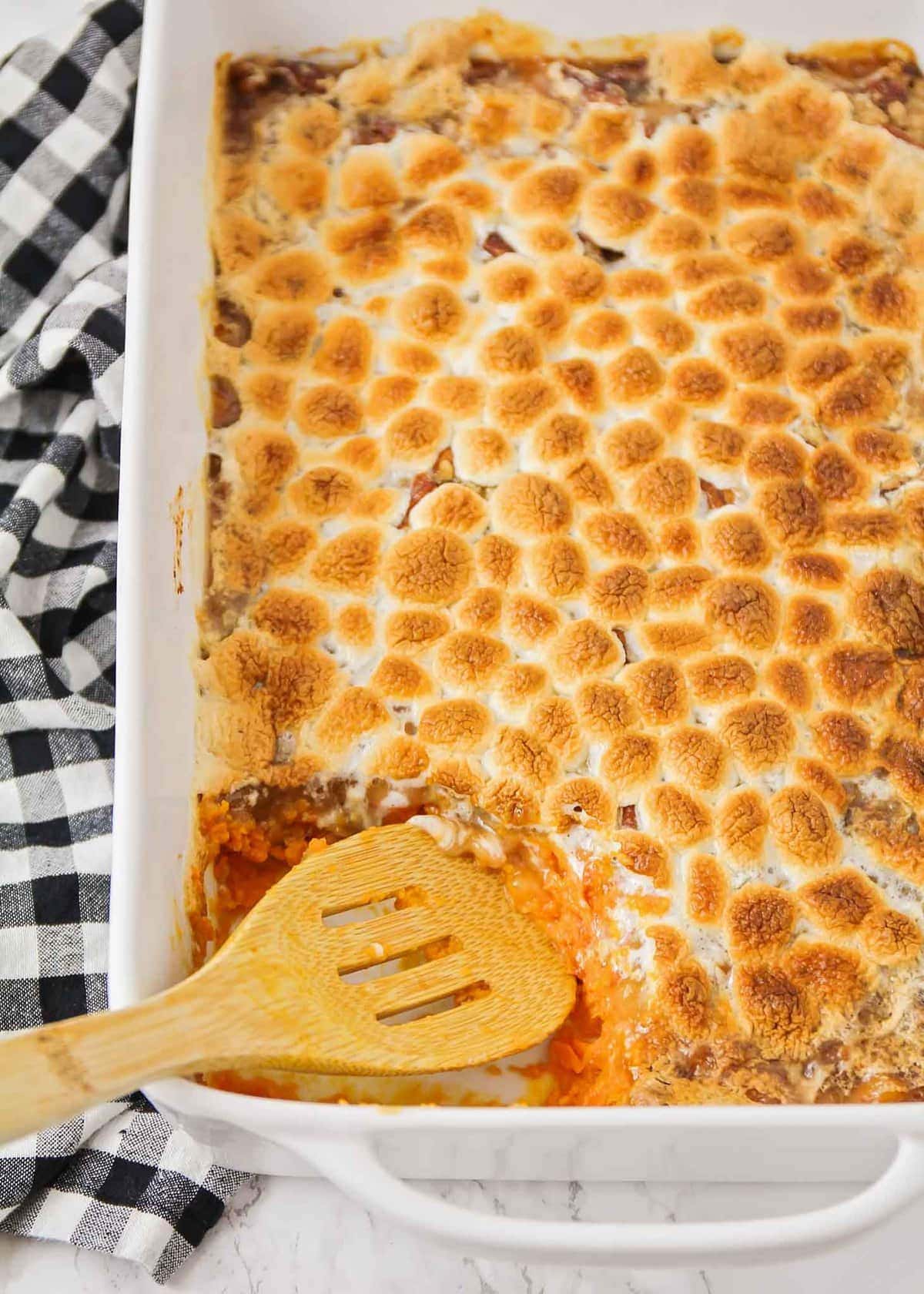 Sweet potato casserole topped with toasted marshmallows.