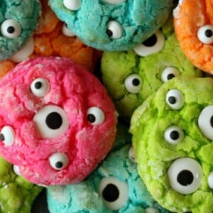 Gooey monster cookies piled together with big google eyes.