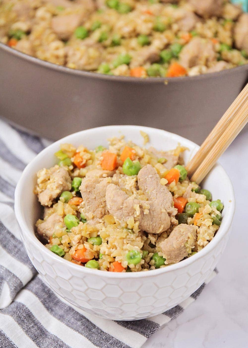 close up of cauliflower fried rice in a bowl