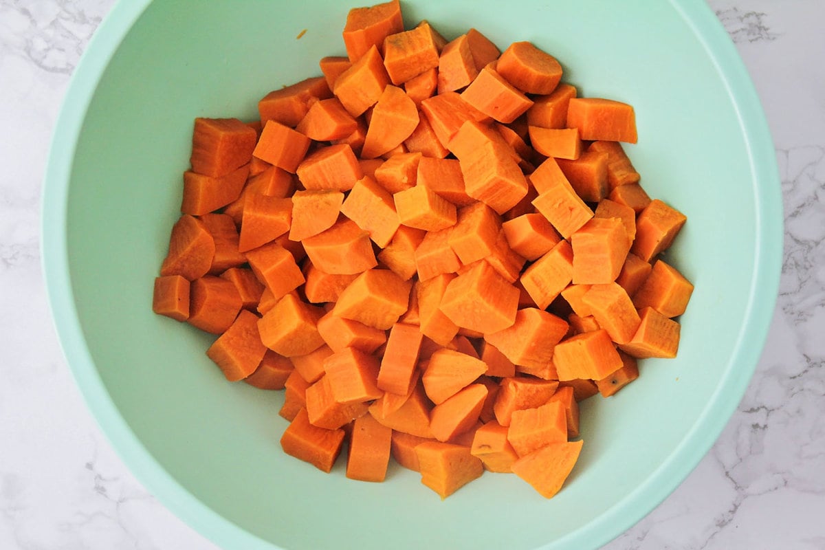 Cubed sweet potatoes in bowl.