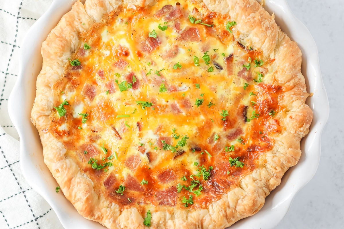 Close up image of ham and cheese quiche recipe.