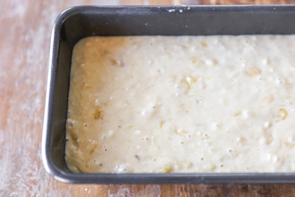 bisquick banana bread batter in a loaf pan