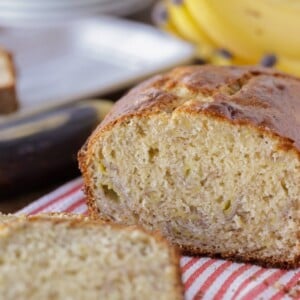 Bisquick banana bread sliced on a kitchen towel.