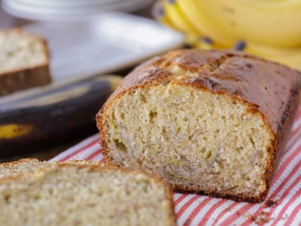 Bisquick banana bread sliced on a kitchen towel.