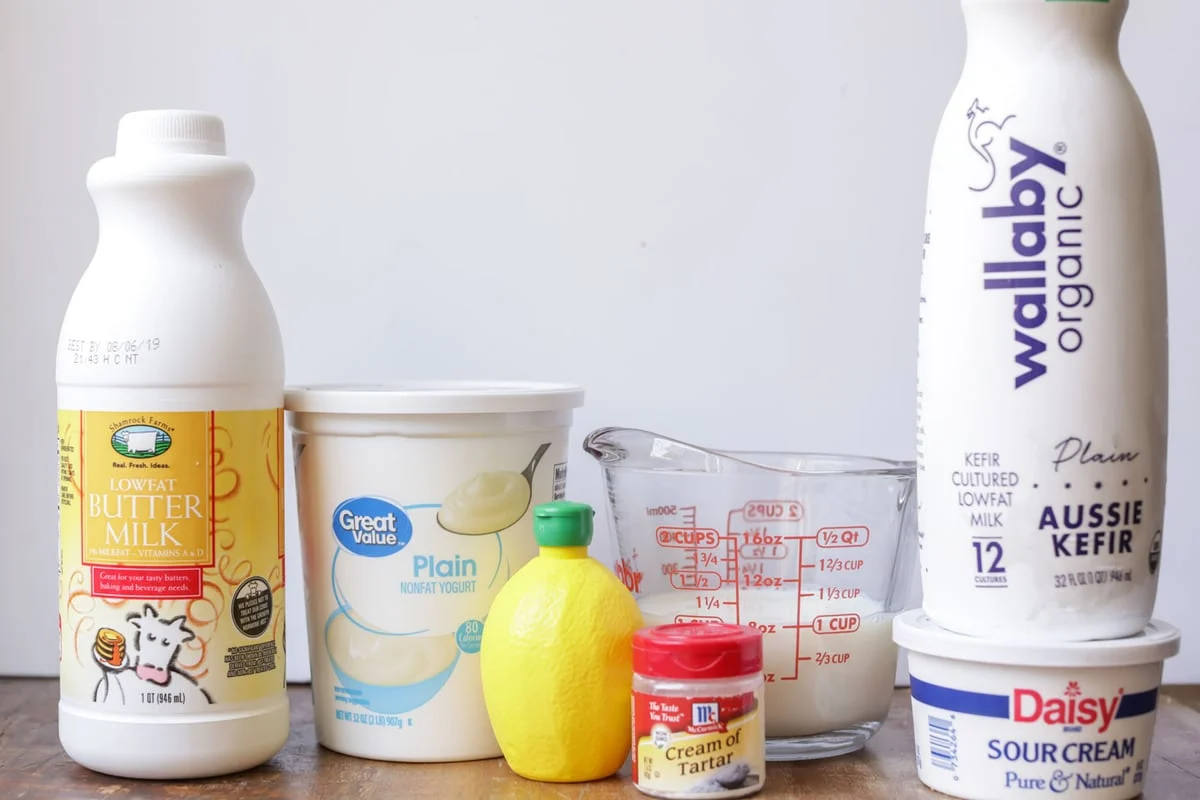 Ingredients for how to make buttermilk substitute on the counter.