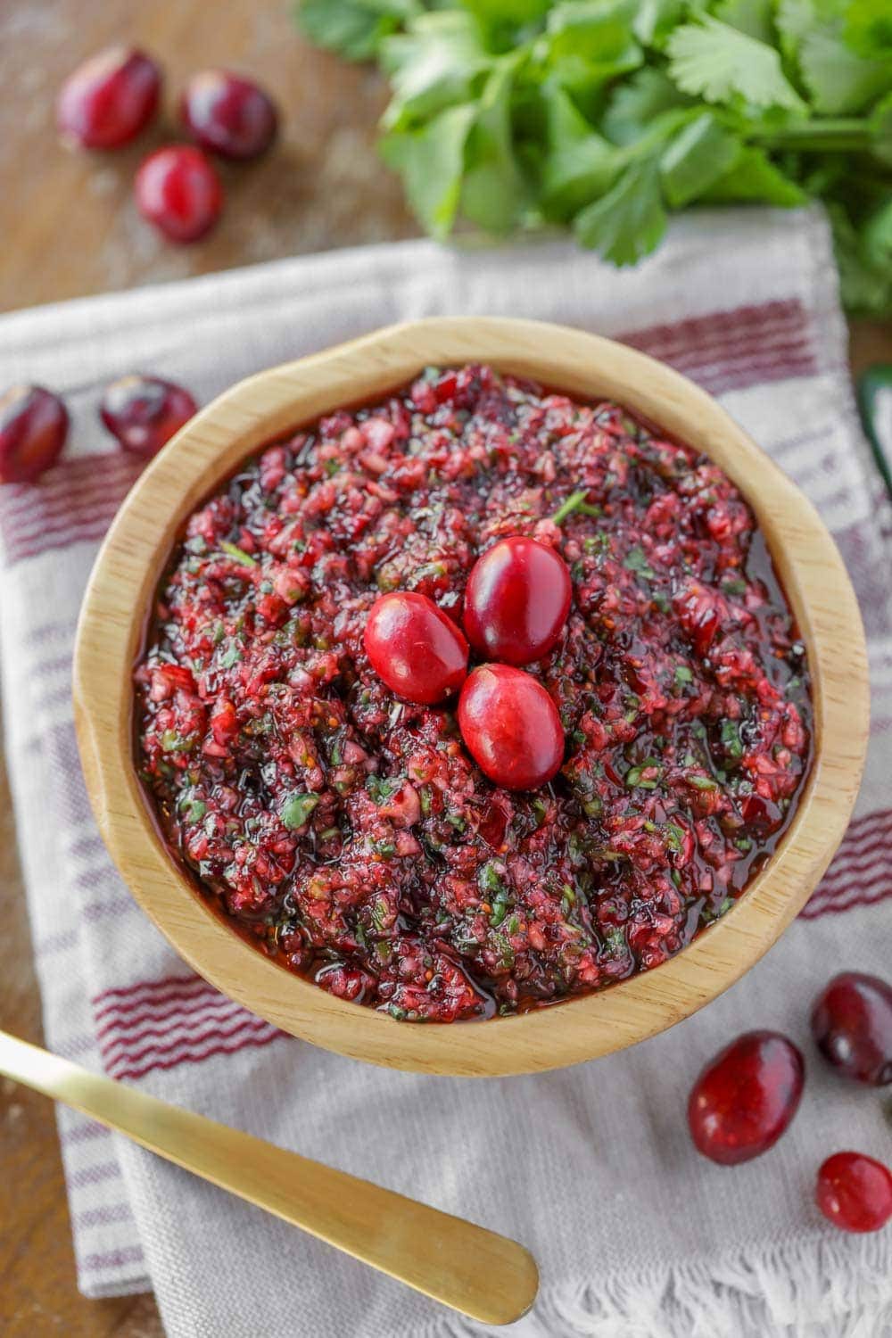 Close up of cranberry salsa dip in a small serving bowl