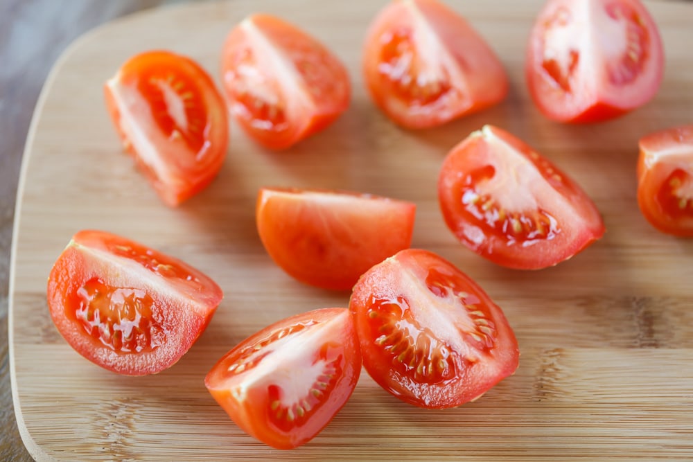Fresh tomatoes cut into quarters