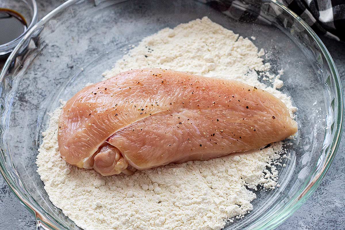Chicken breast dredged in flour