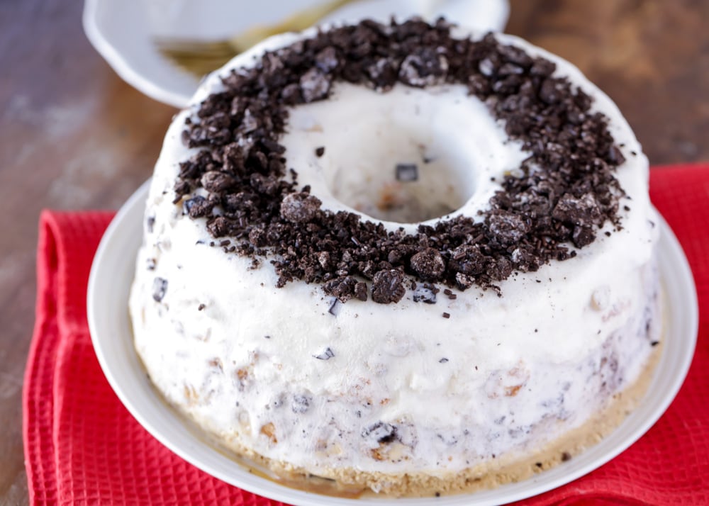 Angel food ice cream cake topped with crushed oreos