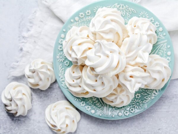 Easy meringue cookies on a blue plate.