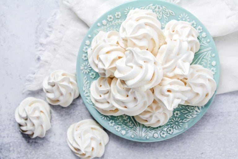 Easy meringue cookies on a blue plate.