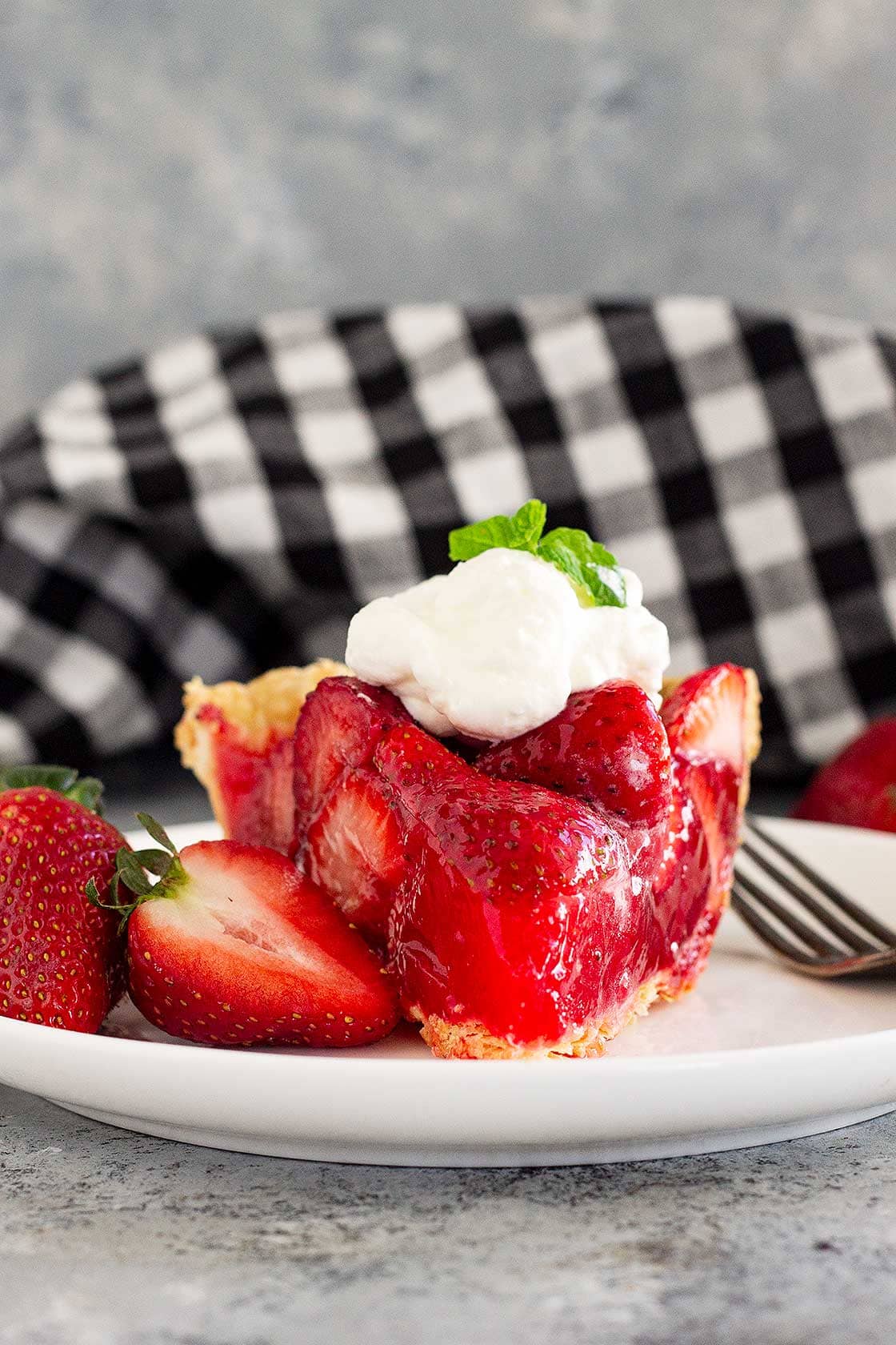 Close up of a slice of strawberry pie