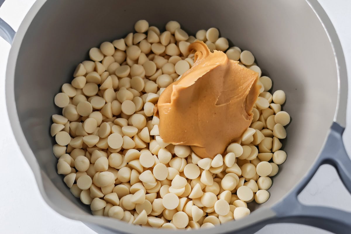 White chocolate and peanut butter in pot ready to melt.