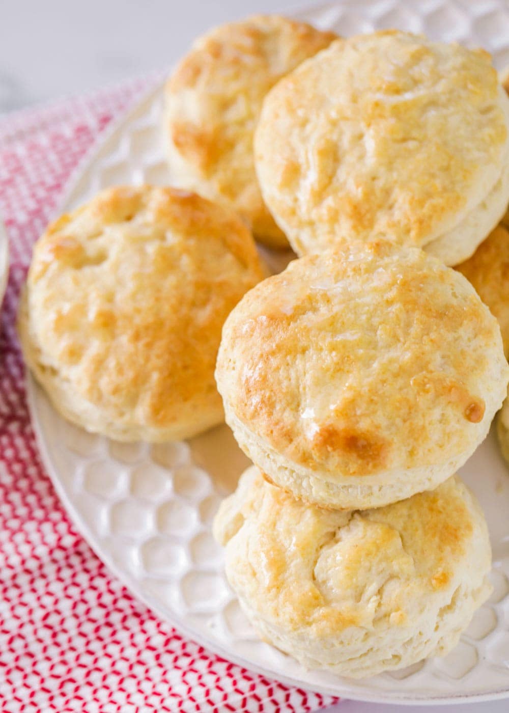 Close up of easy buttermilk biscuits on a white plate