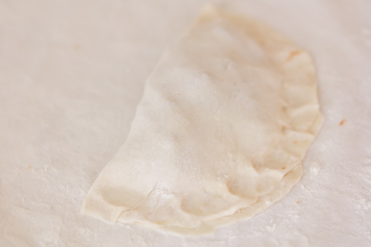 Empanada dough fille and folded over
