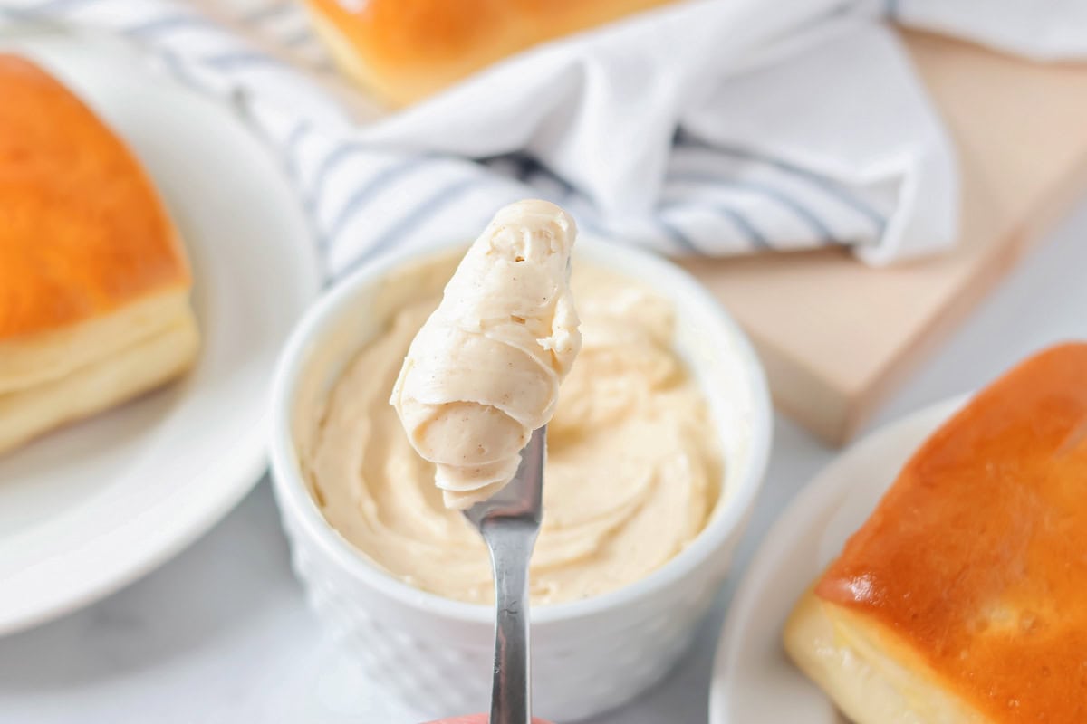 Honey butter scooped with a butter knife.