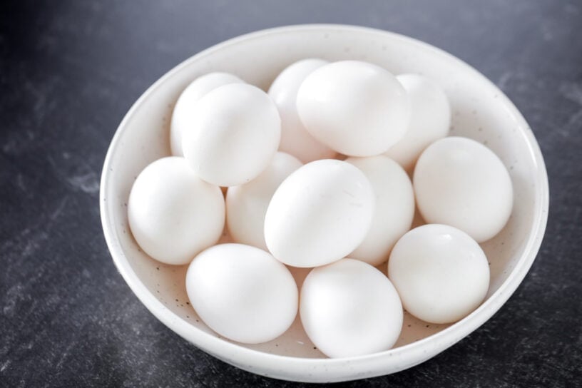 A bowl full of white eggs.