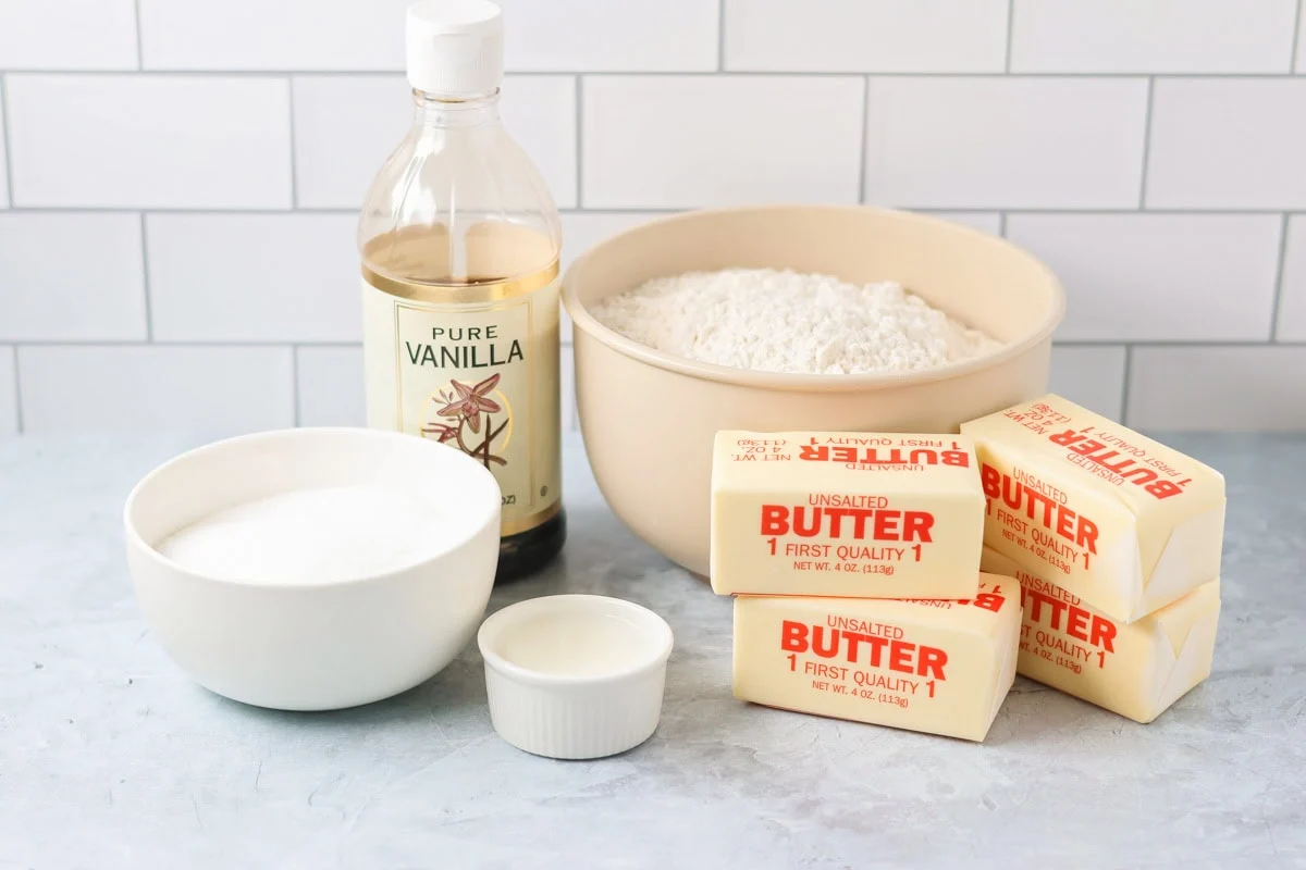Shortbread cookie recipe ingredients on counter.