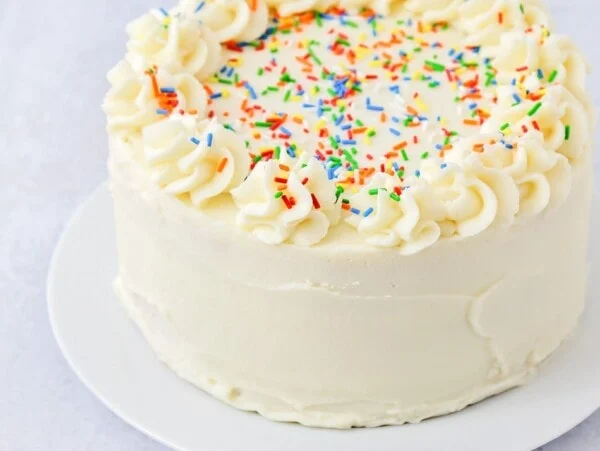 Easy Vanilla buttercream frosting on a cake.