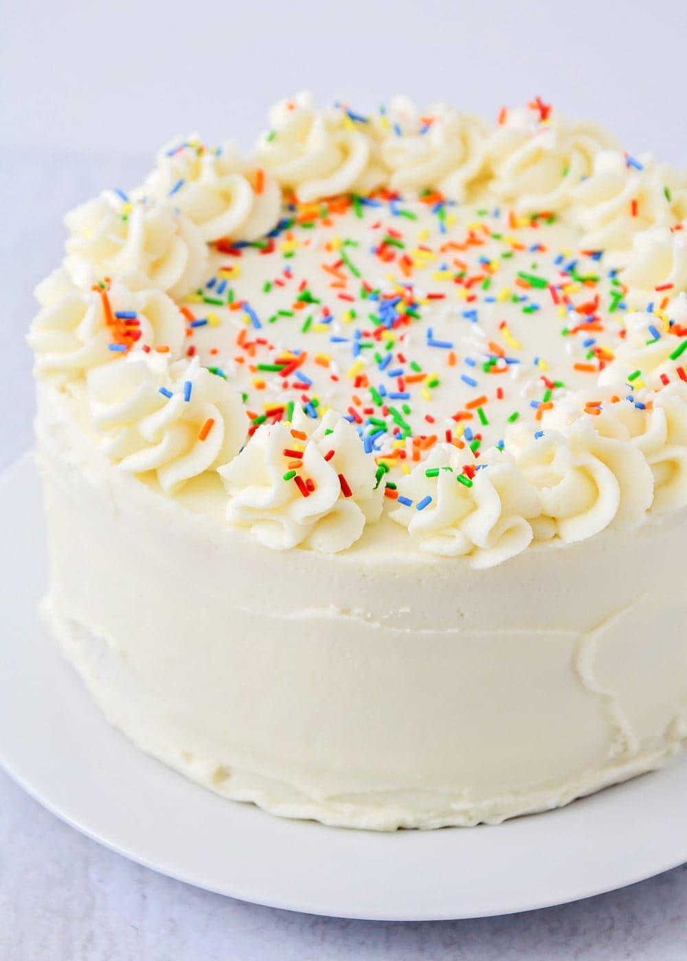 Close up of homemade vanilla frosting on a cake