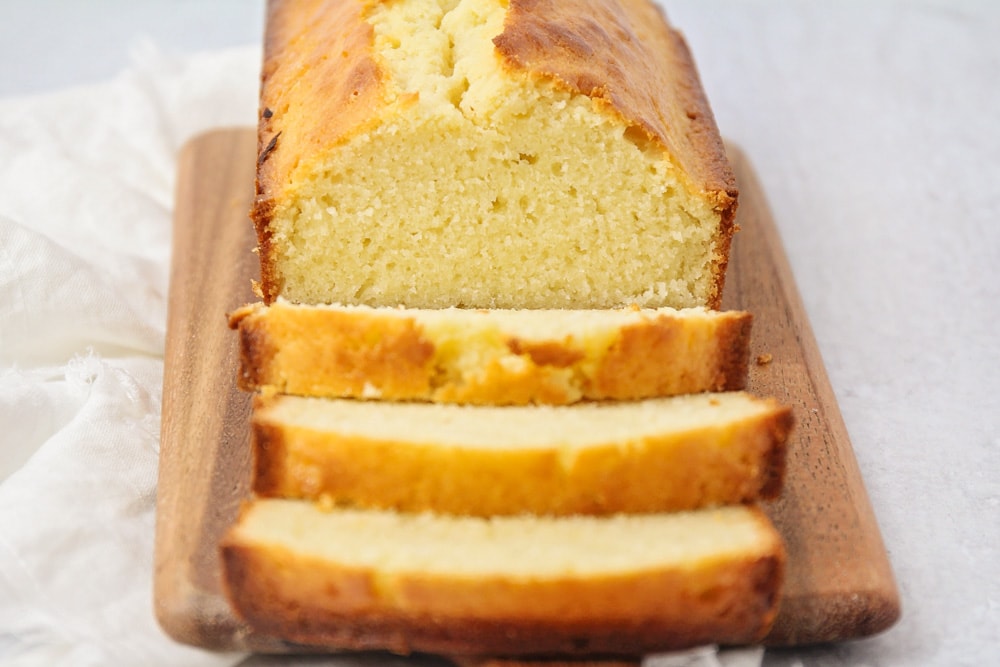 A loaf of pound cake cut into slices