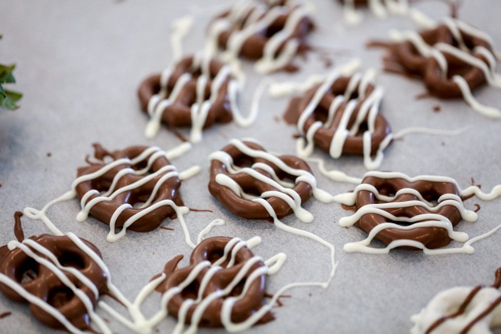 Chocolate covered pretzels with white chocolate drizzle
