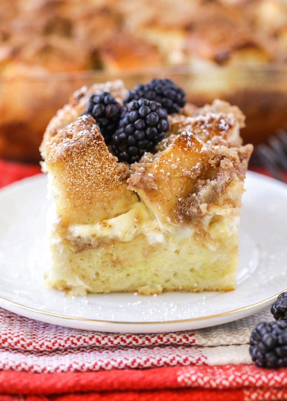French toast casserole with cream cheese topped with blackberries 