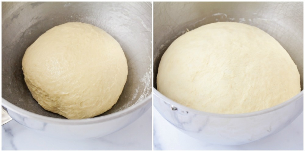 Crescent roll dough shaped and rising in a metal bowl.