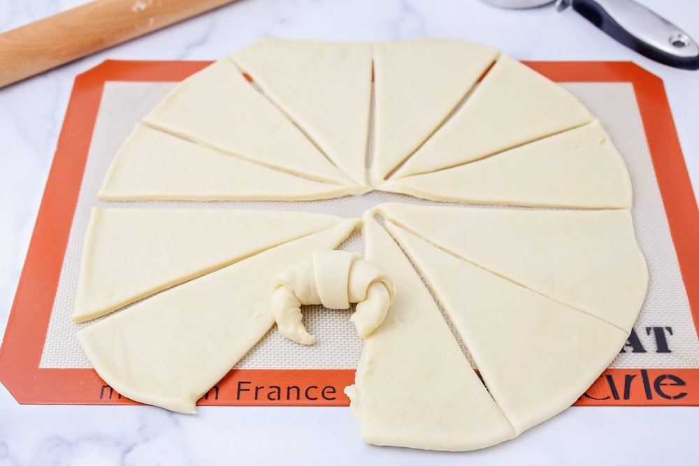 How to roll crescent rolls and cut into triangles.