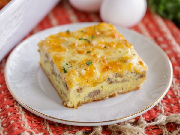 Crescent Roll Breakfast Casserole slice on white plate.