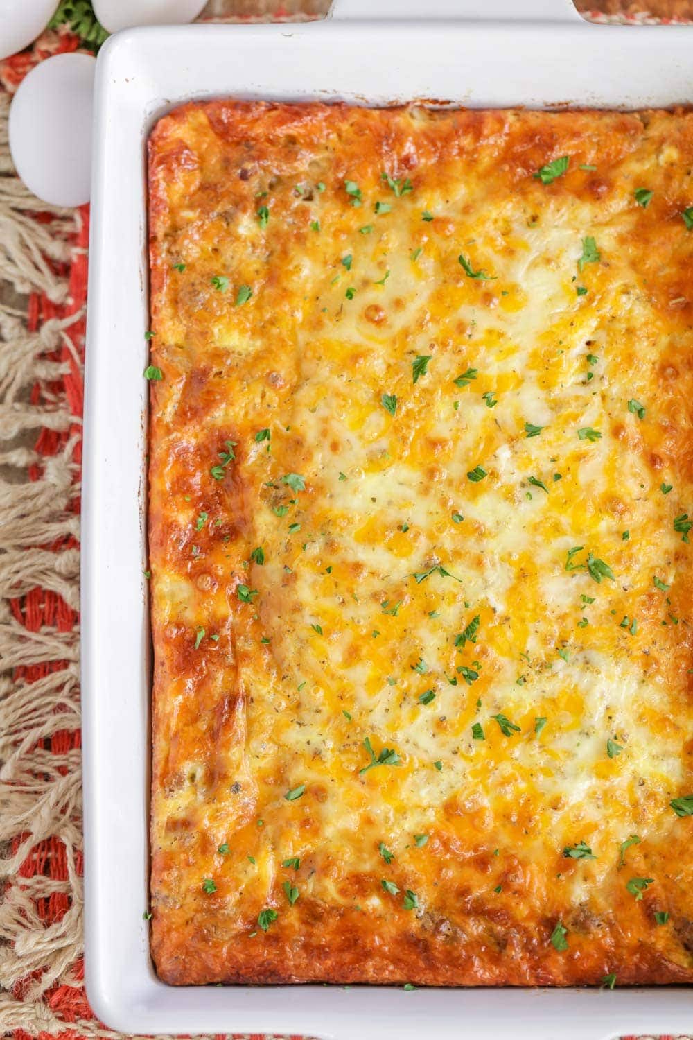 Crescent roll breakfast casserole in a white casserole dish