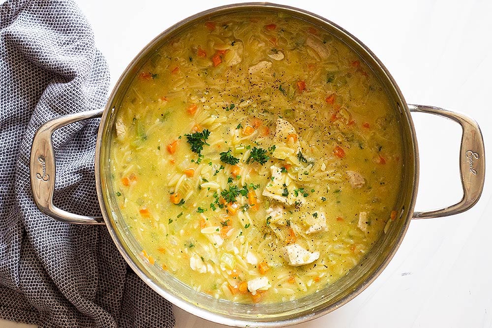 Chicken orzo recipe cooking in a pot