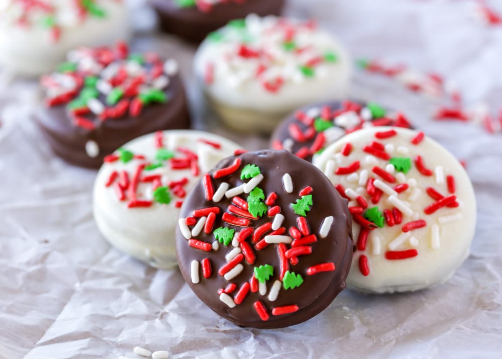 Chocolate covered Christmas Oreos with sprinkles