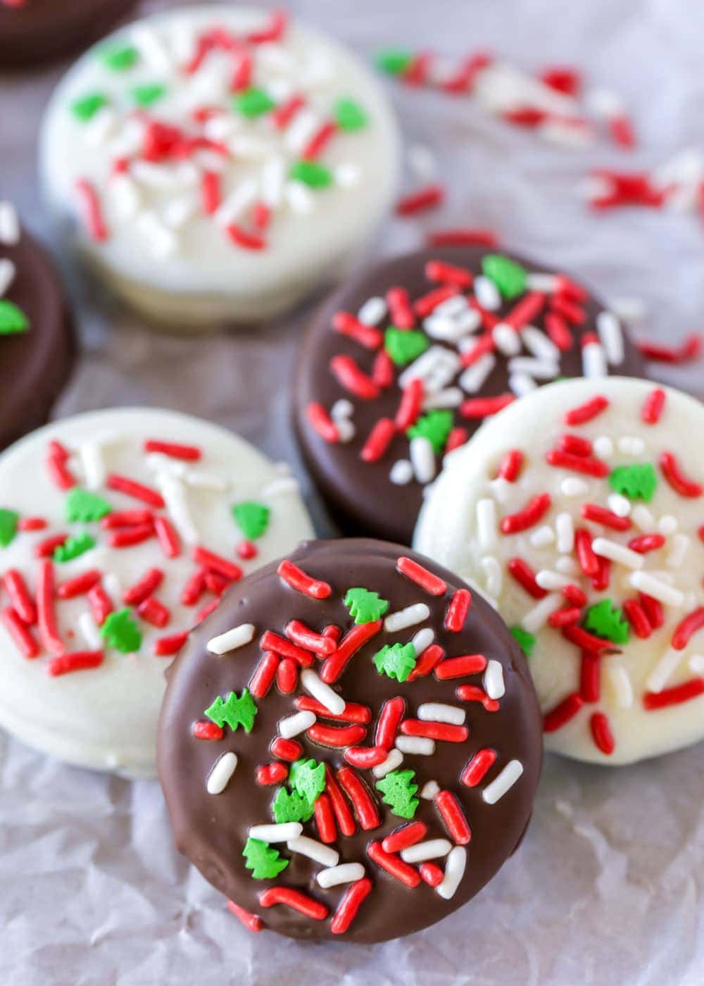 Close up of Christmas Oreos covered in milk and white chocolate