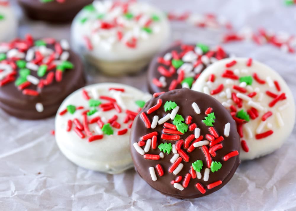 Christmas chocolate covered Oreos recipe on parchment paper.