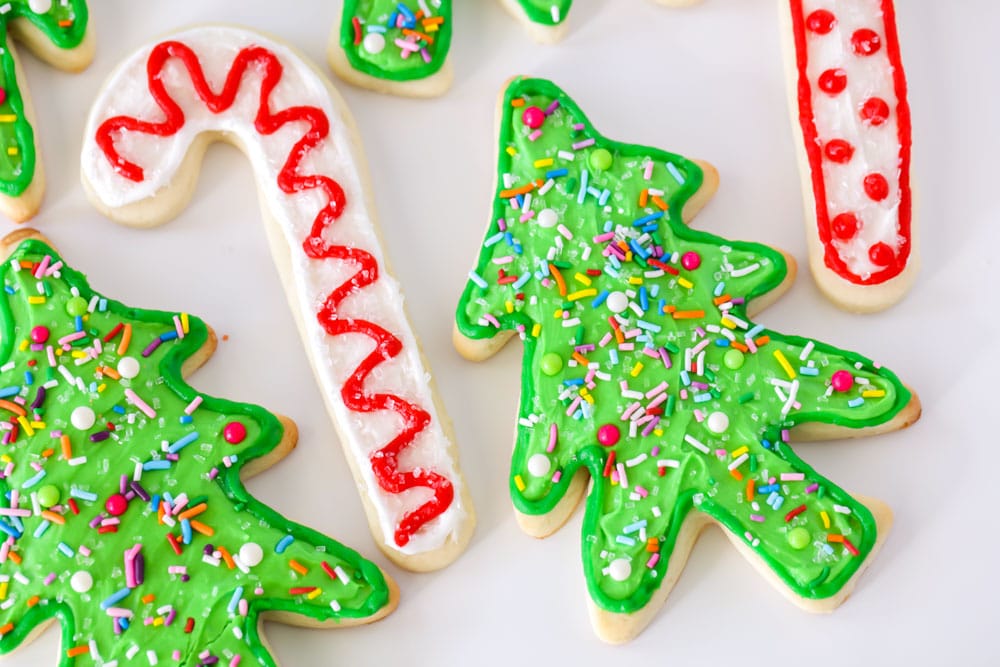 Christmas Sugar Cookies in the shape of candy canes and trees.