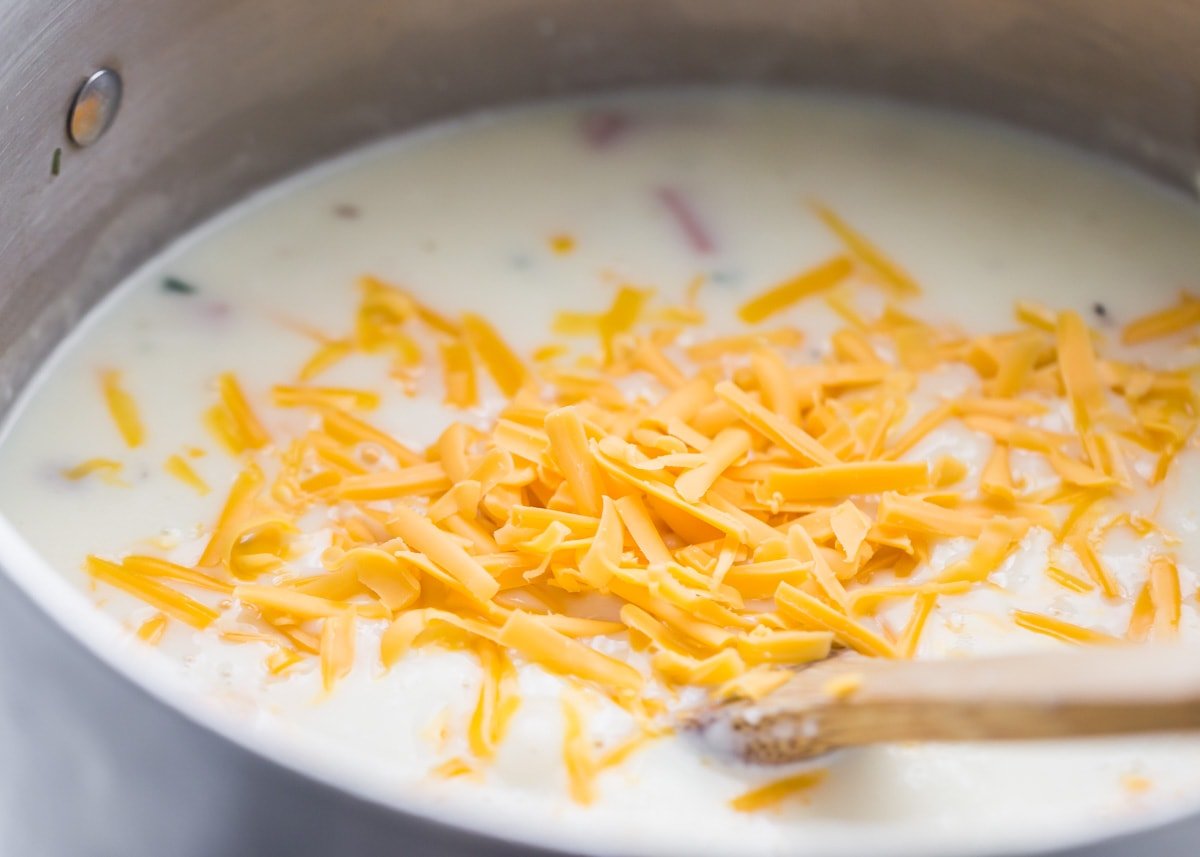 Cheesy ham and potato soup recipe close up image