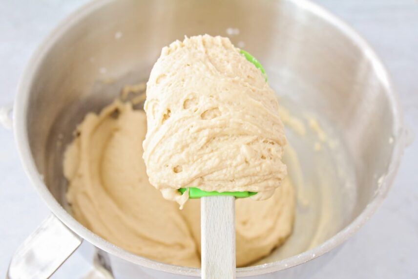 Frosting for caramel cake in a mixing bowl.
