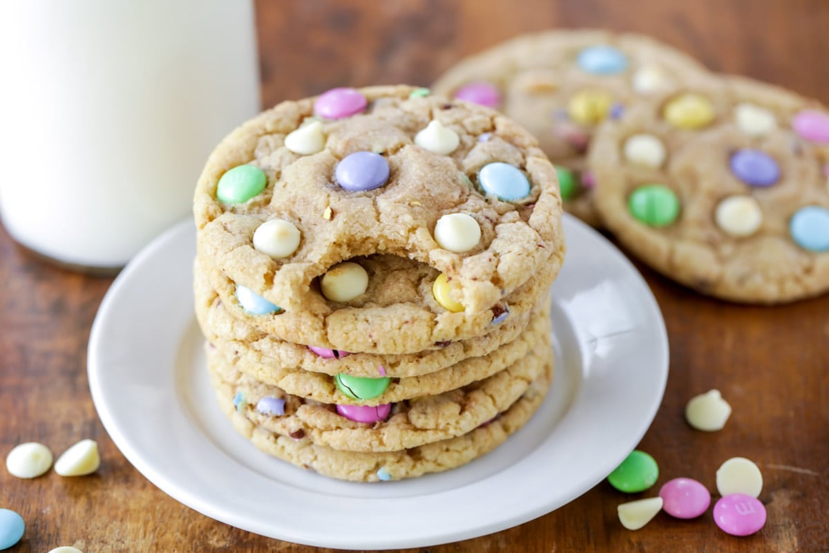Easter Cookies stacked on a white plate.
