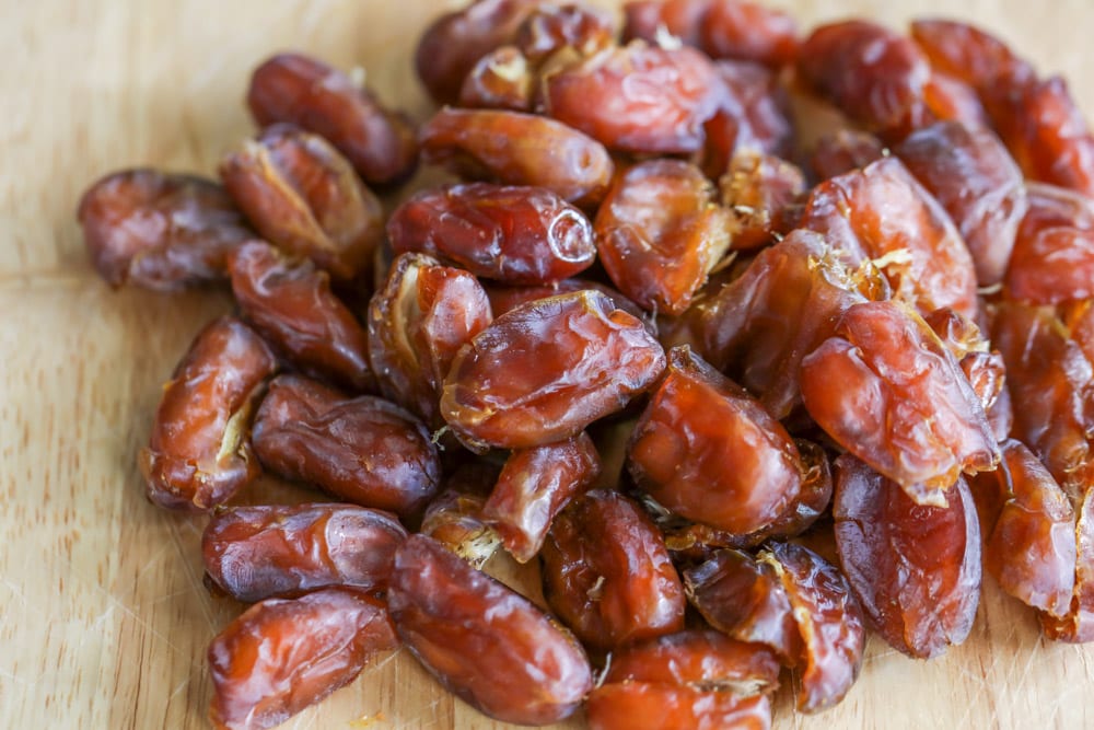 A pile of pitted dates for bacon wrapped dates recipe