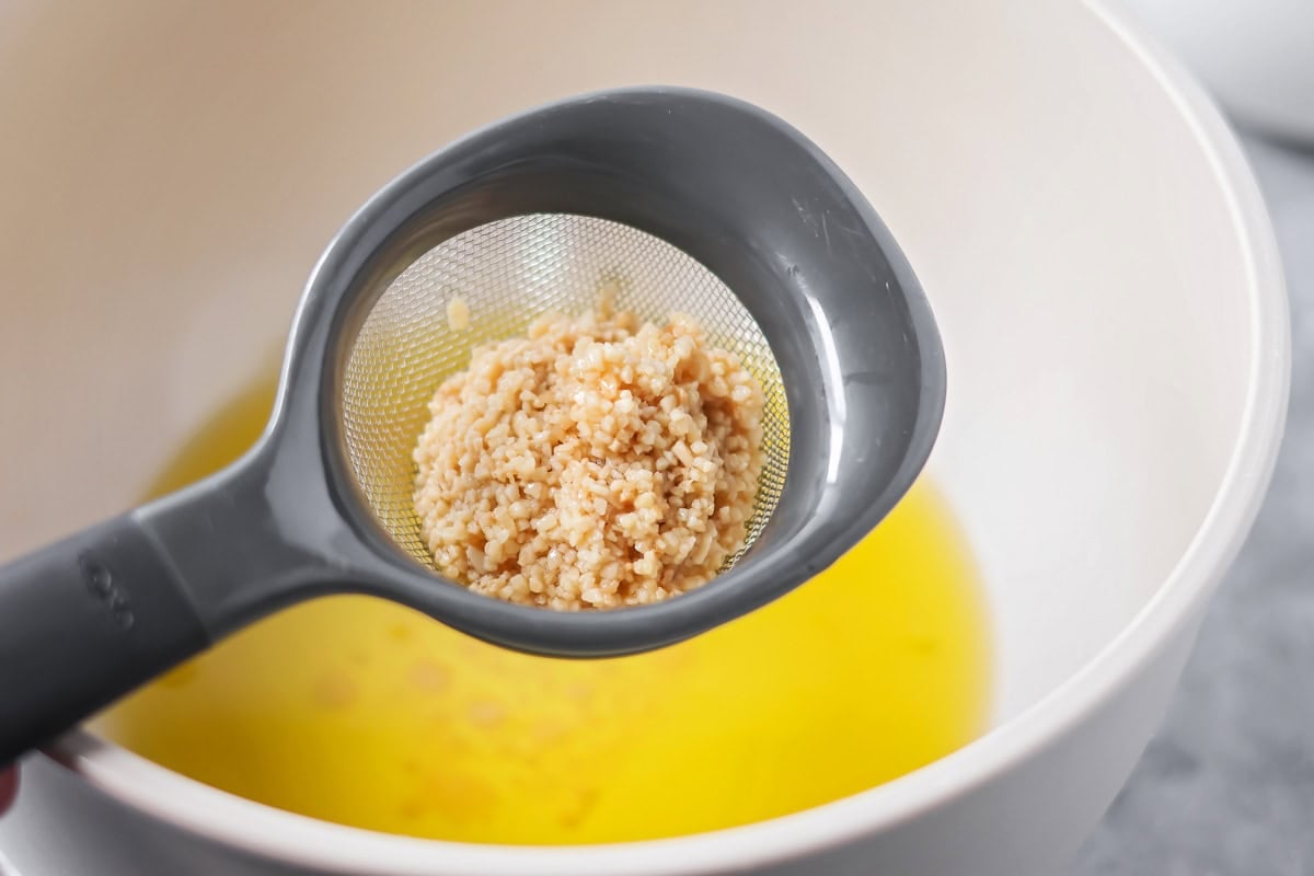 Garlic infused oil in bowl.