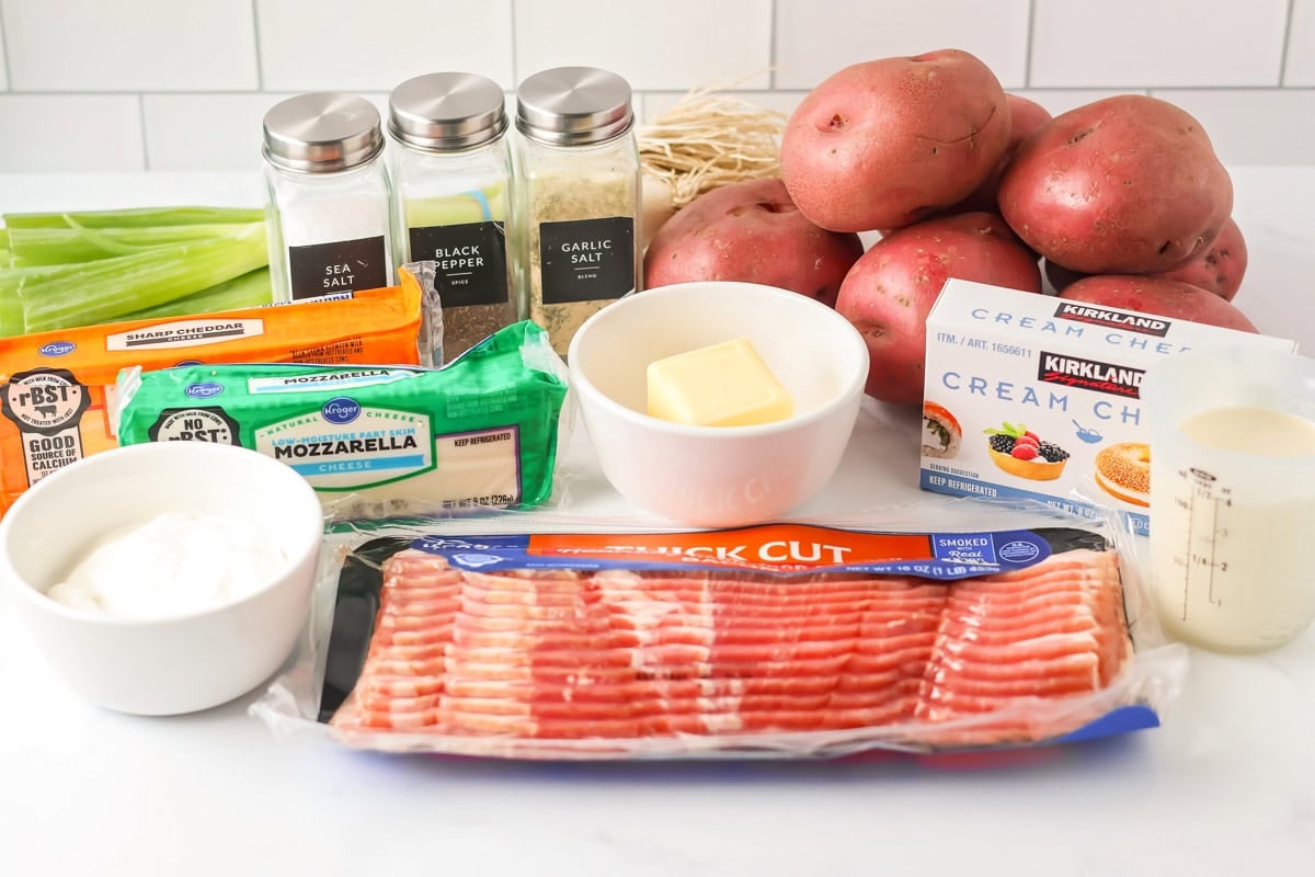 Ingredients for twice baked potato casserole on a kitchen counter.