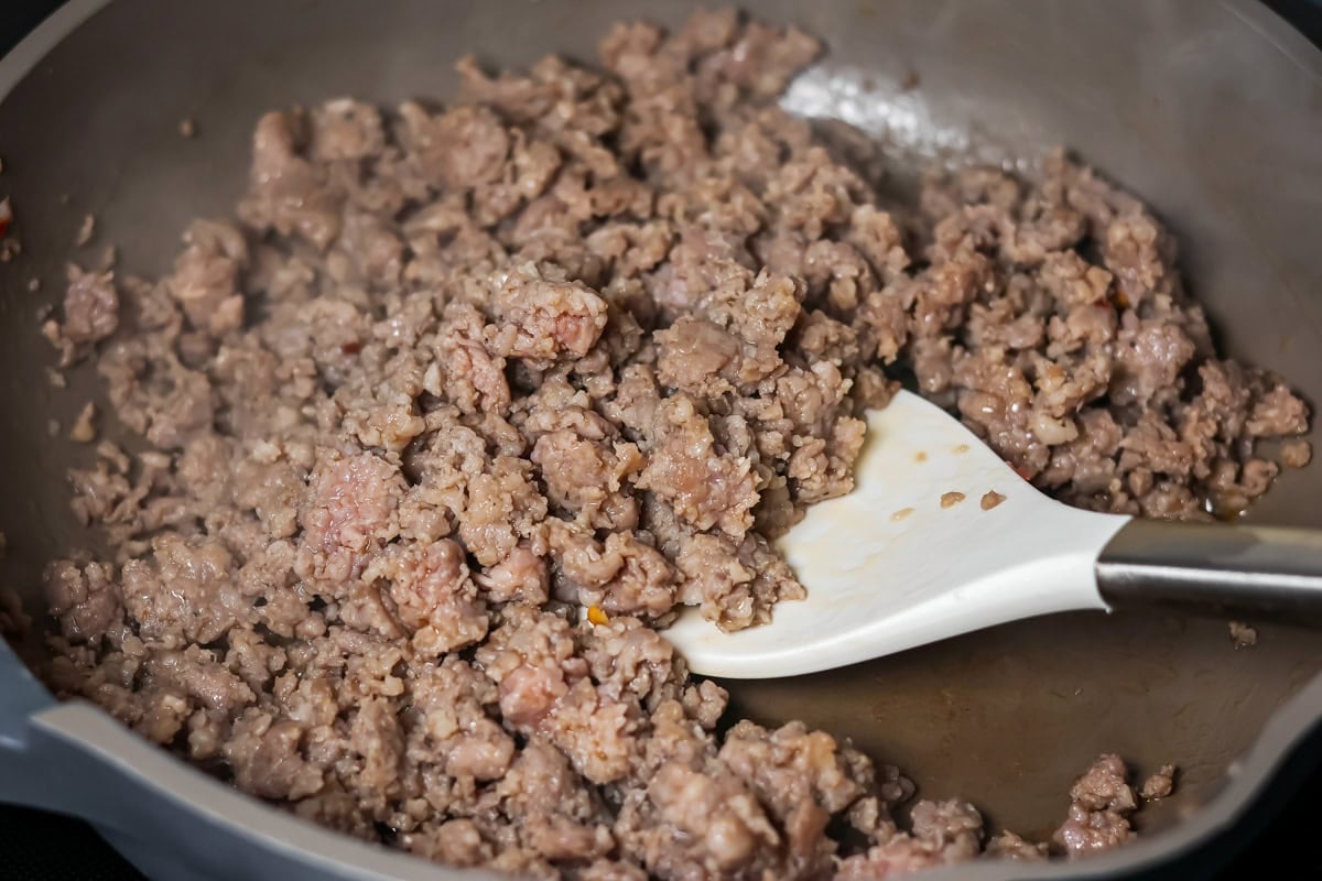 Browning sausage for Christmas breakfast casserole in a pan.