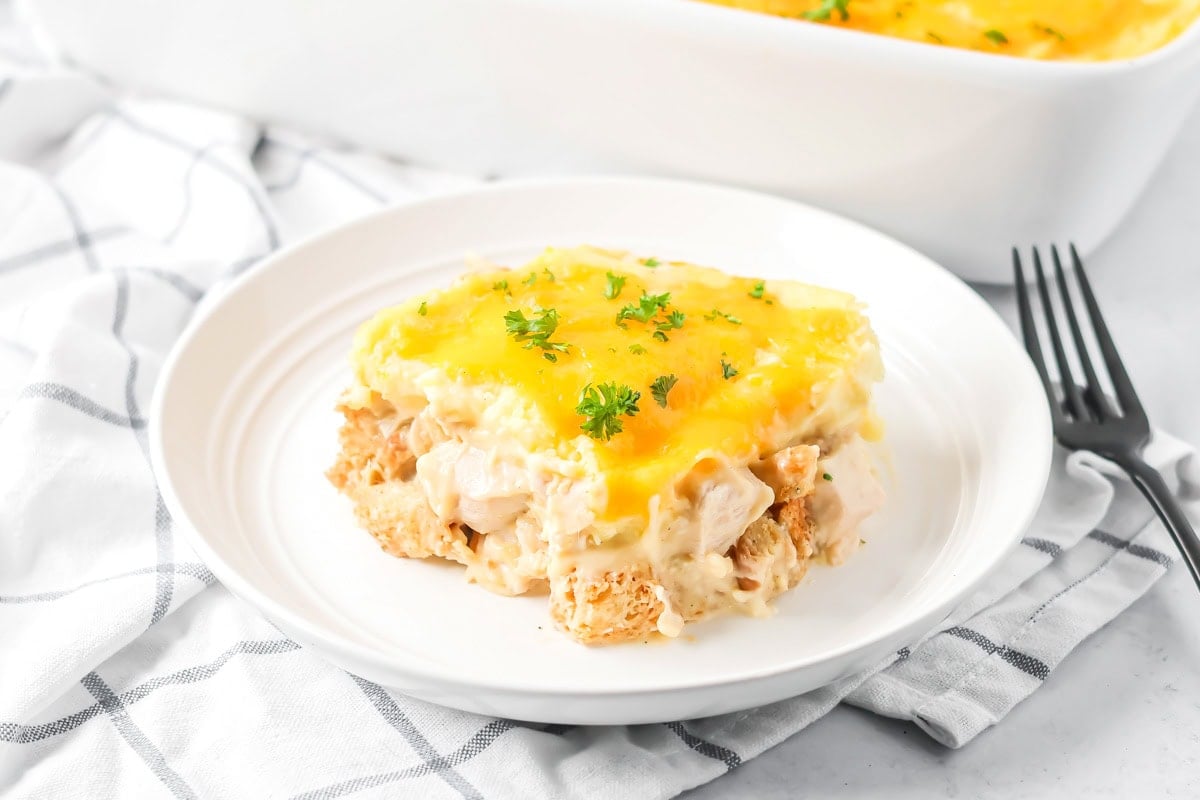 A serving of thanksgiving leftover casserole on a white plate.