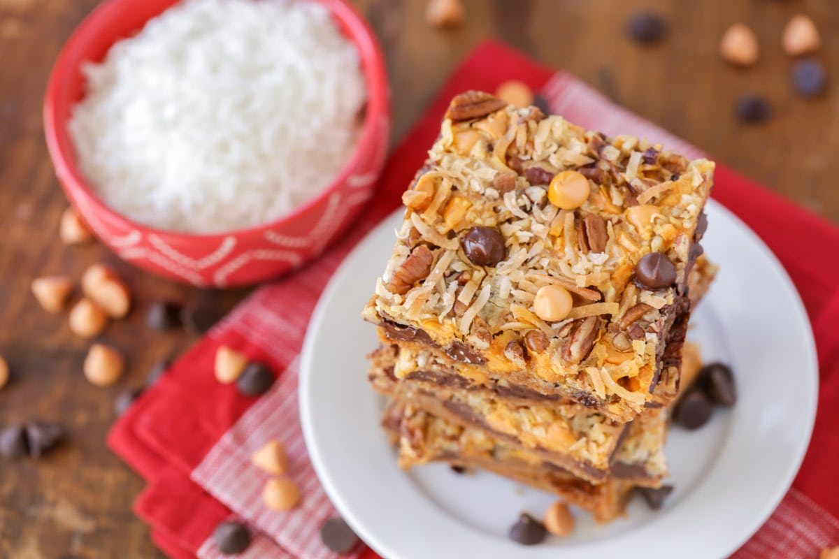 7 layer bars stacked on a white plate.