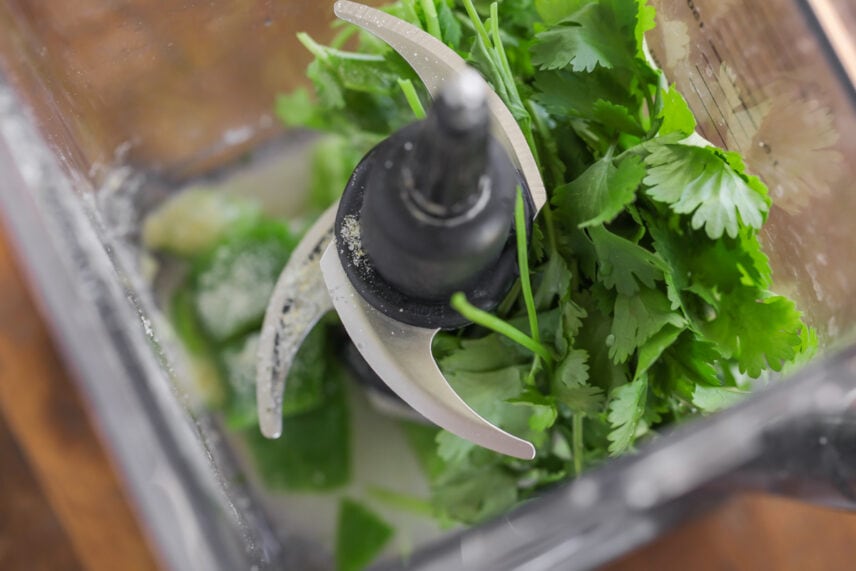 Blending ingredients for cilantro lime dressing,